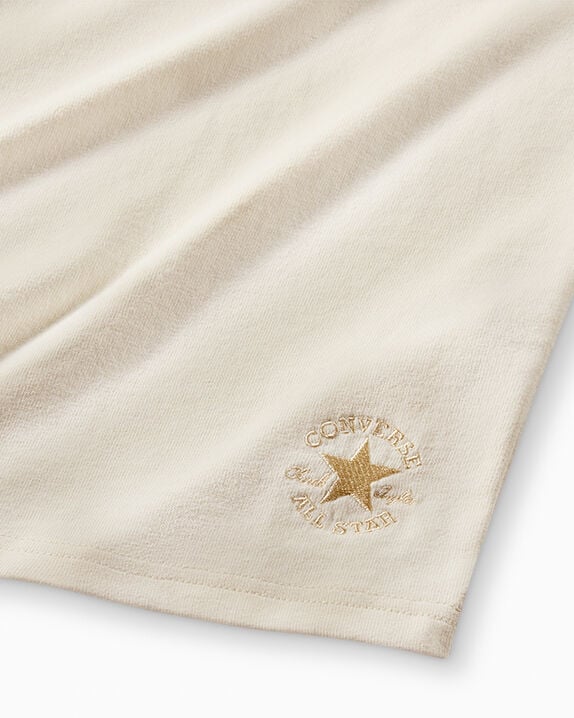 Camiseta estándar dorada de Converse x A Ma Maniére
