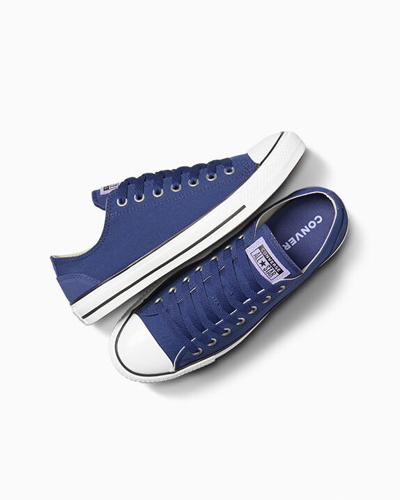 Chuck Taylor All Star de caña baja de poliéster y gamuza