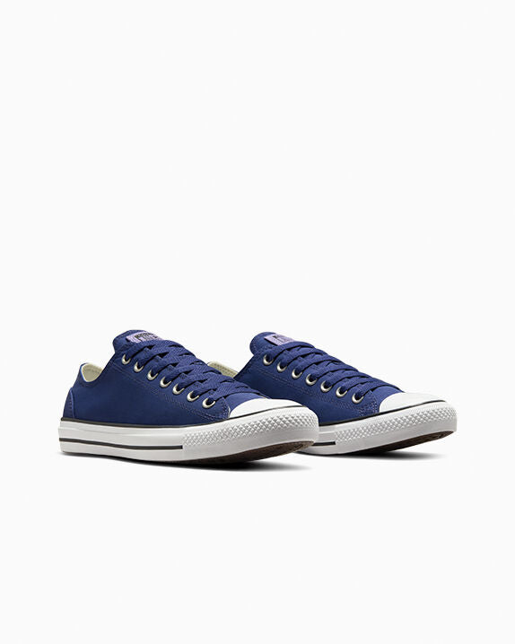 Chuck Taylor All Star de caña baja de poliéster y gamuza
