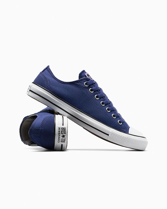 Chuck Taylor All Star de caña baja de poliéster y gamuza