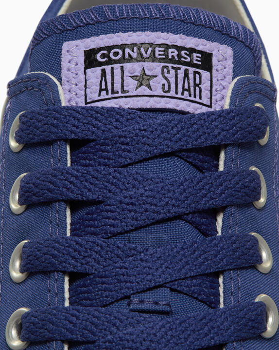 Chuck Taylor All Star de caña baja de poliéster y gamuza