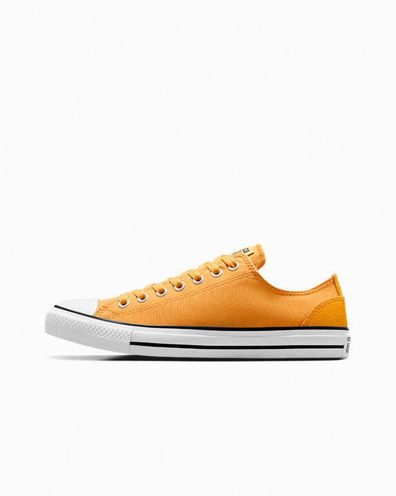 Chuck Taylor All Star de caña baja de poliéster y gamuza