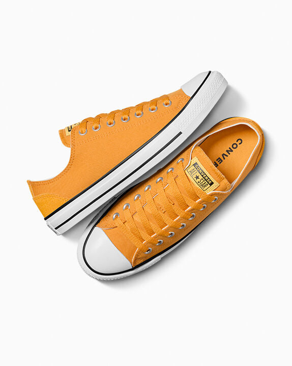 Chuck Taylor All Star de caña baja de poliéster y gamuza